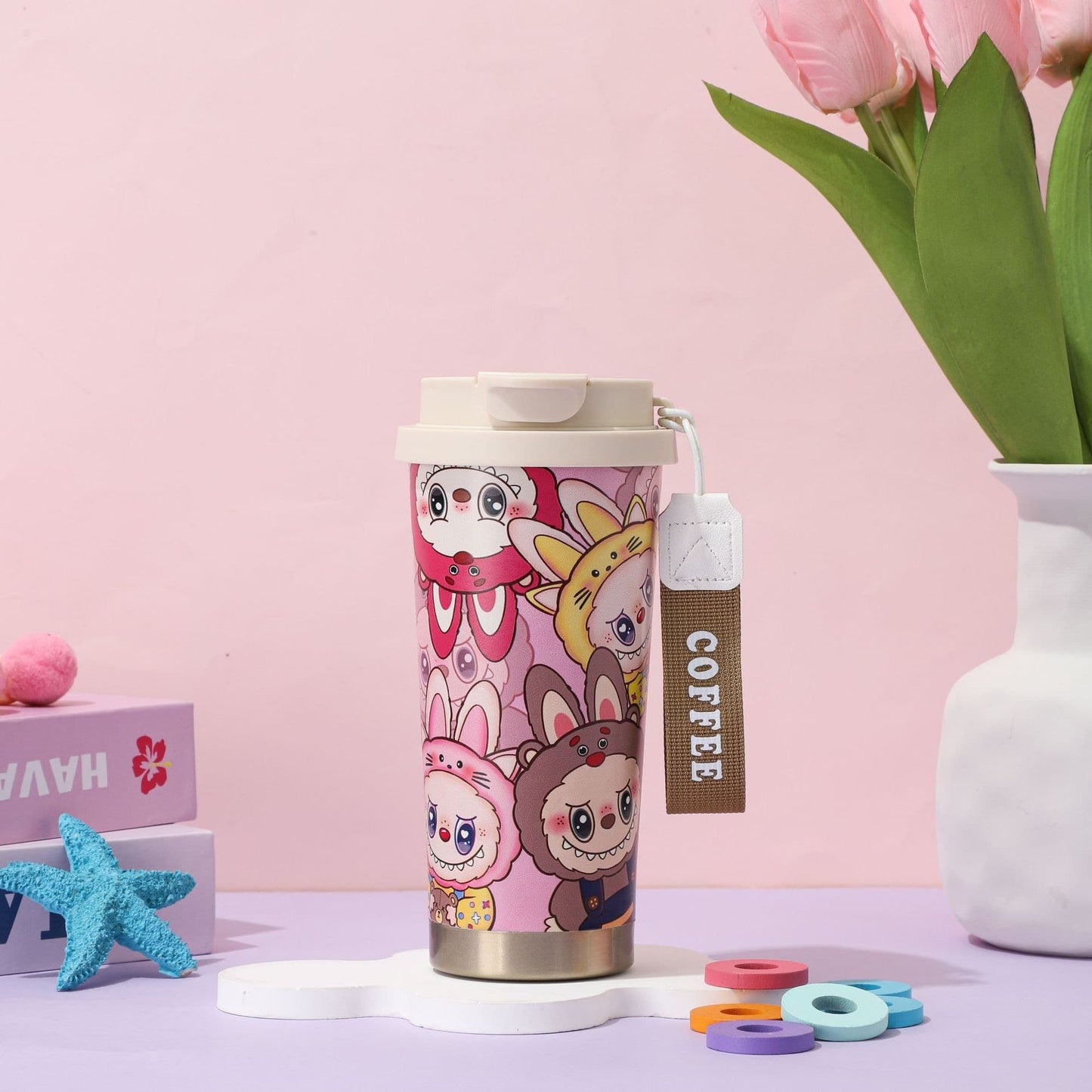 cartoon coffee tumbler with multiple animal characters, pink insulated stainless steel mug with lid and handle strap